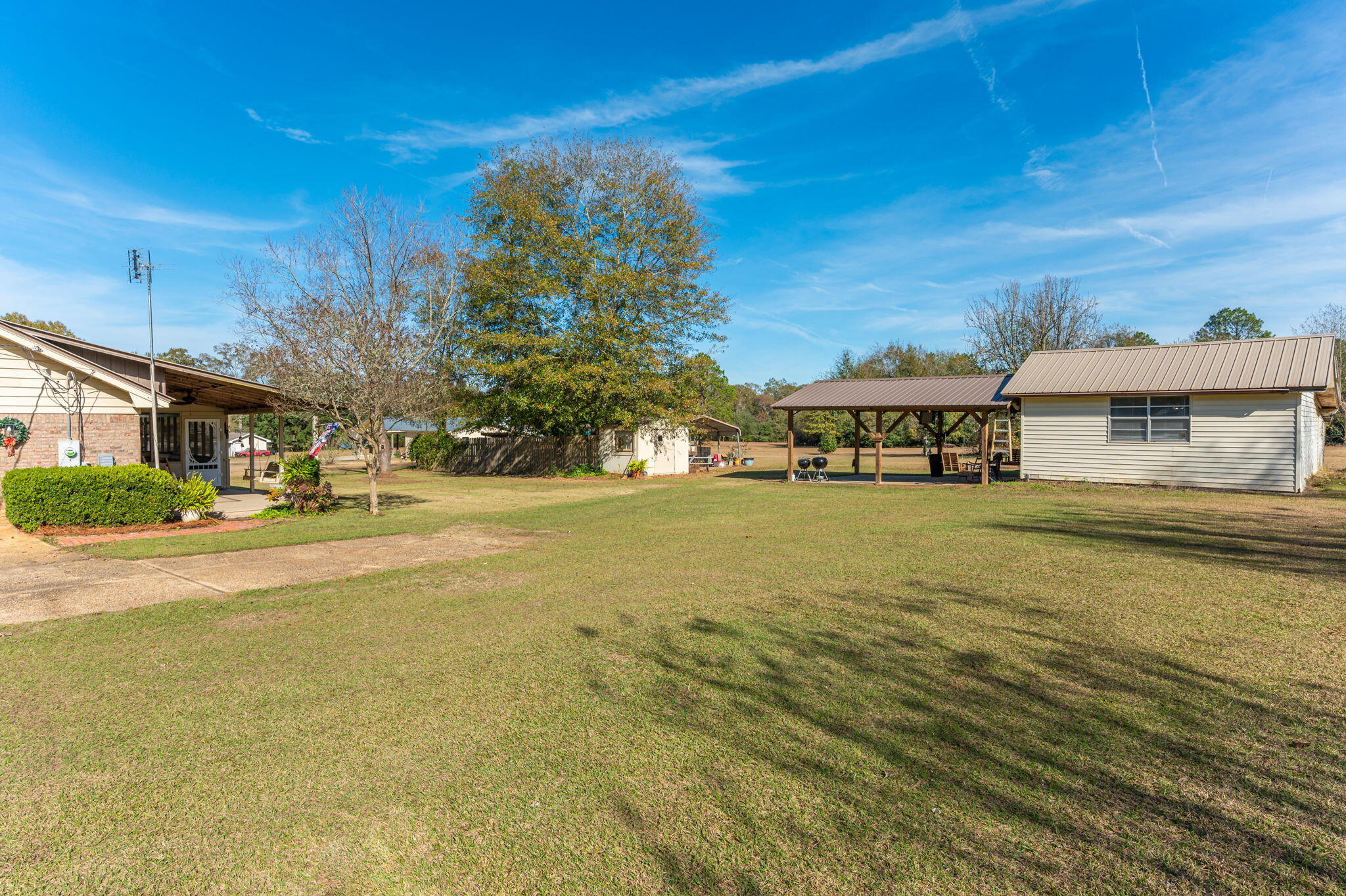5811 Dairy Road Baker, FL 32531 - Photo 33 of 36 a front view of a building with a lake view