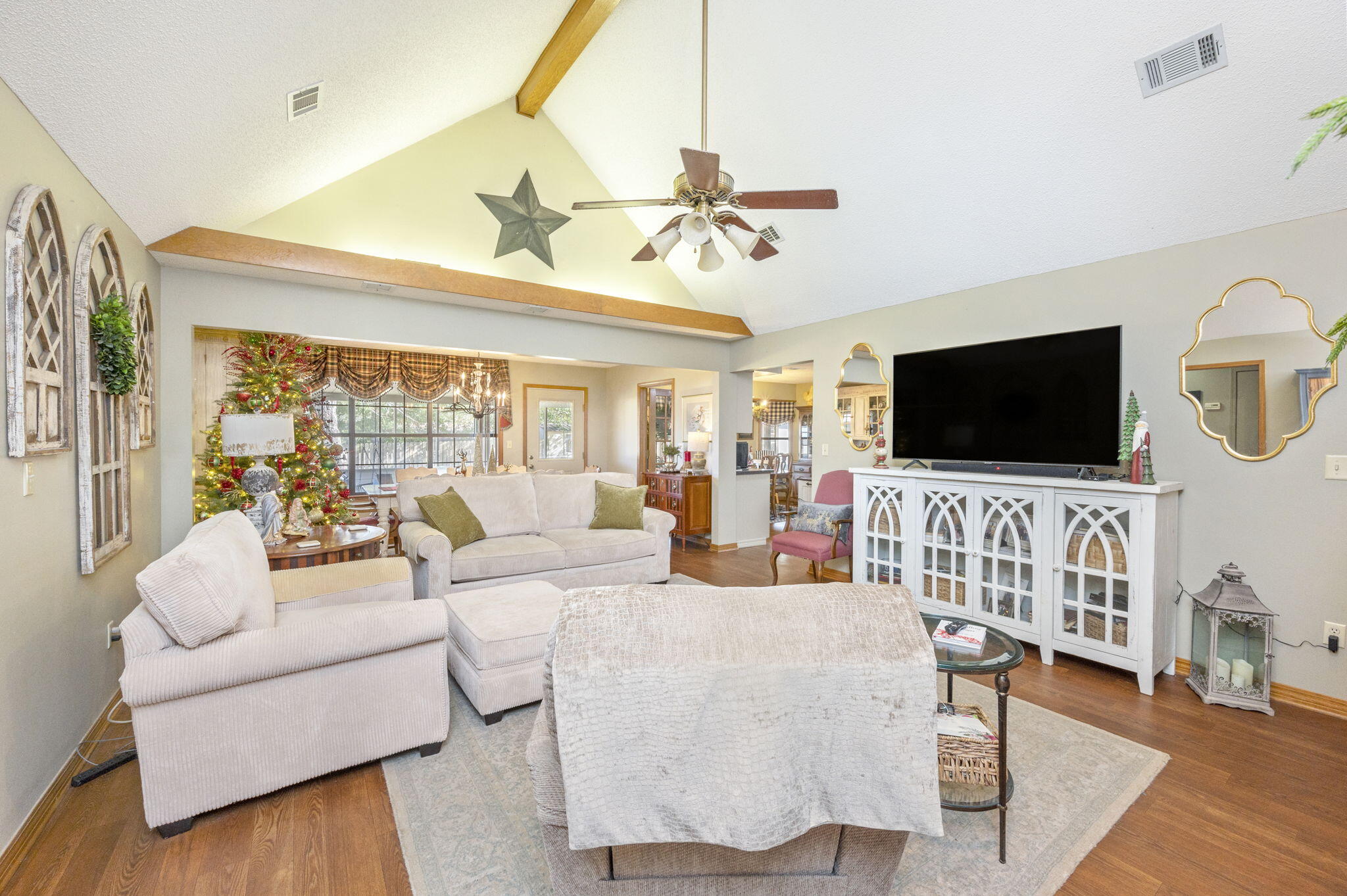 5811 Dairy Road Baker, FL 32531 - Photo 7 of 36 a living room with furniture and a flat screen tv