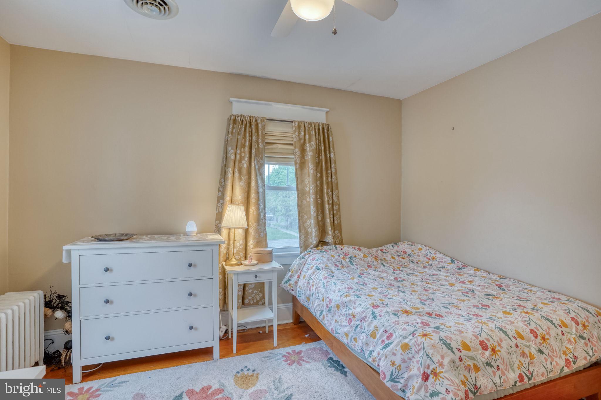 20 Rodney Road Dover, DE 19901 - Photo 56 of 58 a bedroom with a bed and a dresser