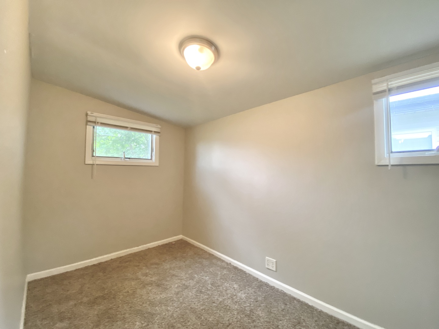 18747 Sherman Street Lansing, IL 60438 - Photo 19 of 20 an empty room with windows