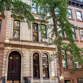 a front view of a building with a porch