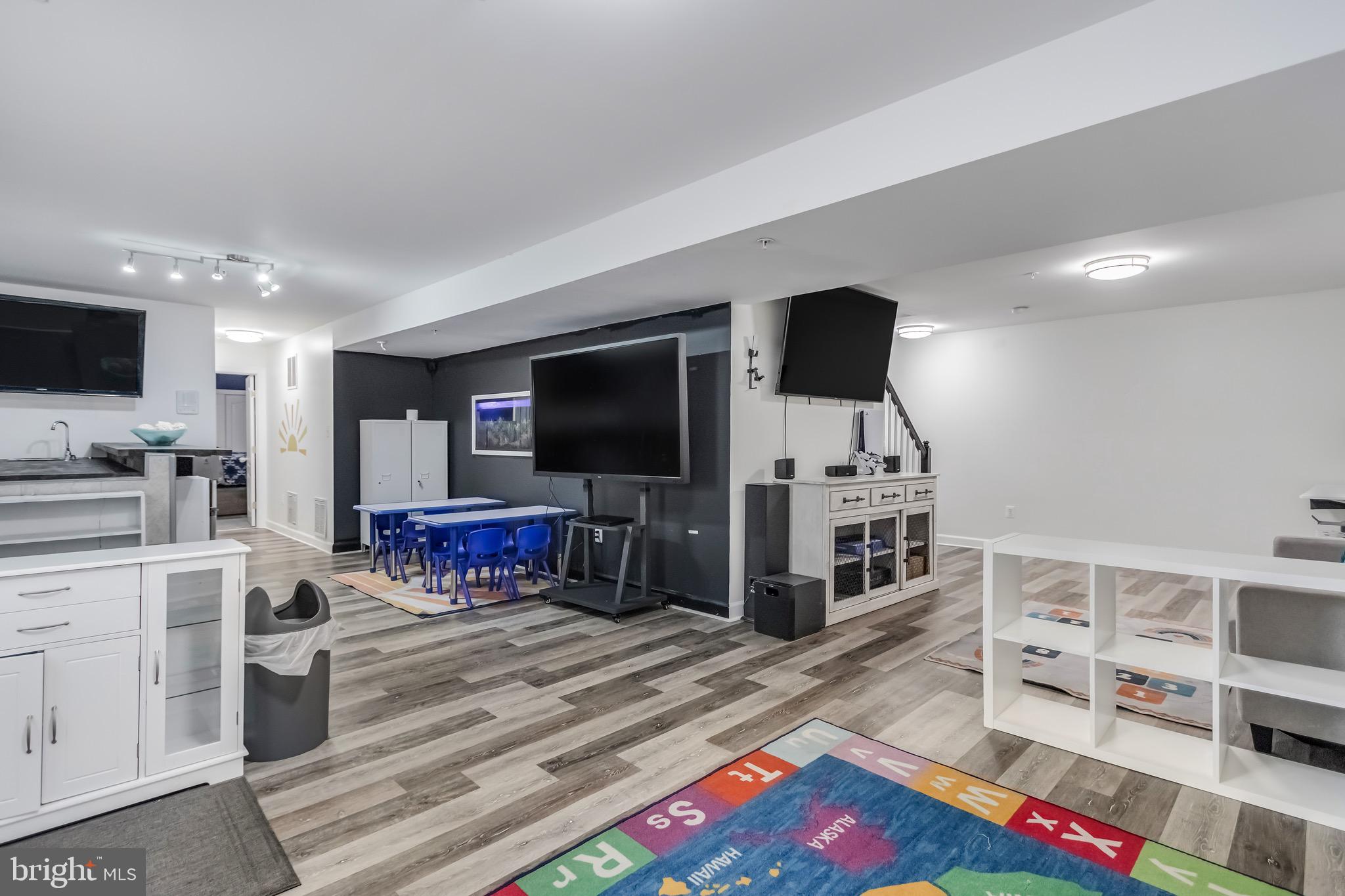 16607 Mannington Road Accokeek, MD 20607 - Photo 22 of 32 a living room with furniture and a flat screen tv