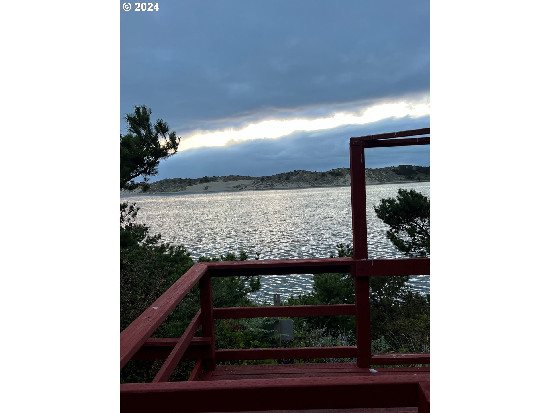 1601 Rhododendron Drive, Unit 694 Florence, OR 97439 - Photo 22 of 32 a view of a small yard