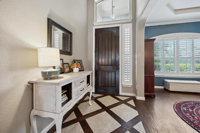 a kitchen with a stove a sink and a refrigerator