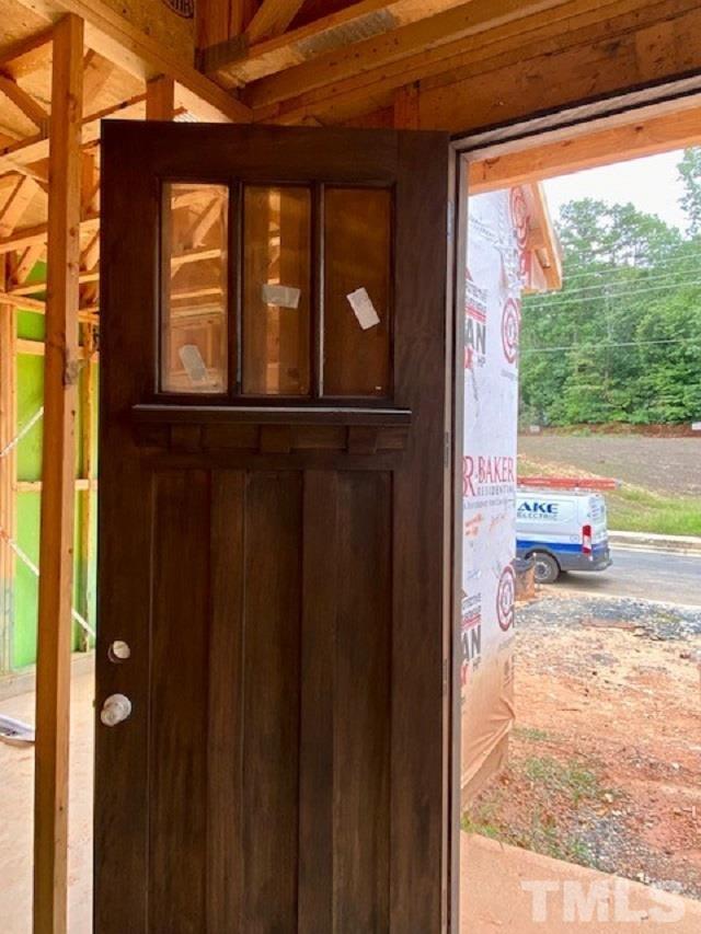 3808 Milltown Ridge Run Raleigh, NC 27612 - Photo 3 of 21 a view of a door and a window