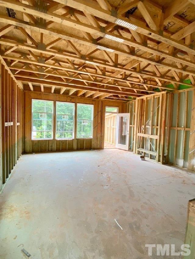 3808 Milltown Ridge Run Raleigh, NC 27612 - Photo 6 of 21 a view of an empty room with a balcony
