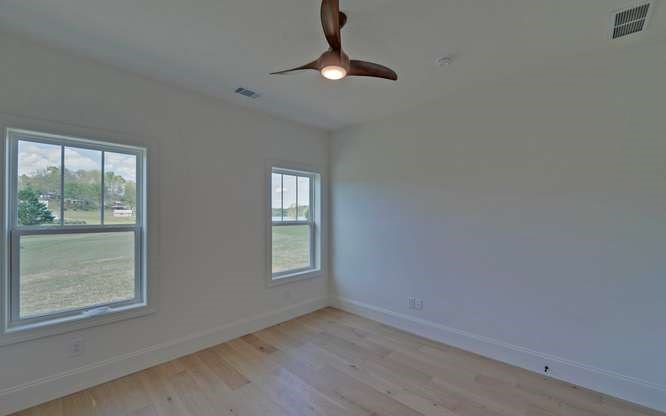 317 Bell Creek Cove Road Hiawassee, GA 30546 - Photo 35 of 74 wooden floor in an empty room with a window