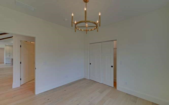 317 Bell Creek Cove Road Hiawassee, GA 30546 - Photo 37 of 74 a view of a chandelier in an empty room