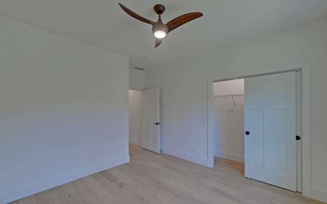 317 Bell Creek Cove Road Hiawassee, GA 30546 - Photo 42 of 74 a view of a hallway with a ceiling fan