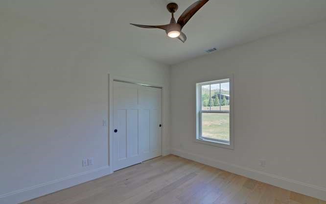 317 Bell Creek Cove Road Hiawassee, GA 30546 - Photo 43 of 74 a view of an empty room with a window
