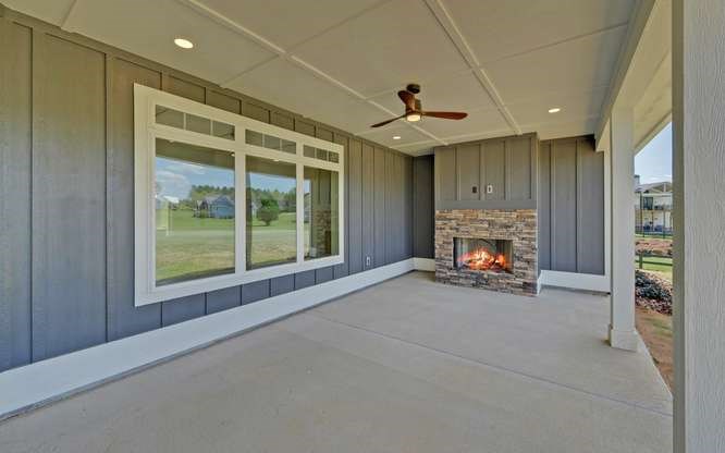 317 Bell Creek Cove Road Hiawassee, GA 30546 - Photo 50 of 74 a view of an empty room with a fireplace and a window