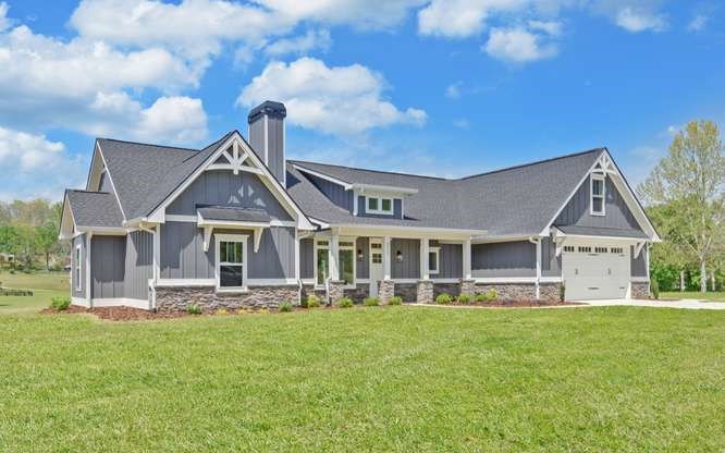 317 Bell Creek Cove Road Hiawassee, GA 30546 - Photo 55 of 74 a front view of a house with a yard