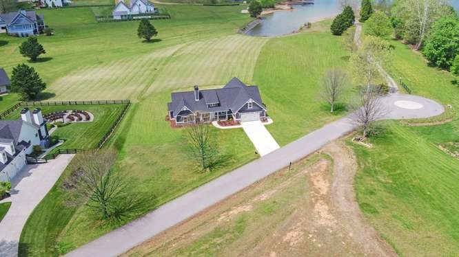 317 Bell Creek Cove Road Hiawassee, GA 30546 - Photo 64 of 74 an aerial view of a pool with a yard