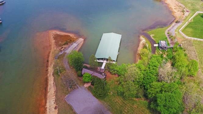 317 Bell Creek Cove Road Hiawassee, GA 30546 - Photo 69 of 74 an aerial view of a house with a yard and garden