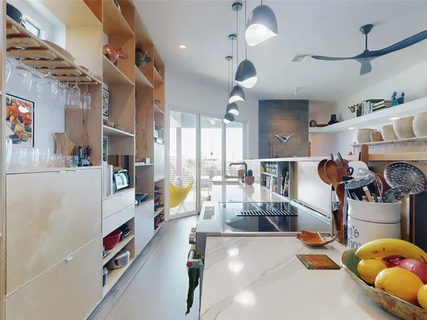 a view of living room with furniture and baby toys