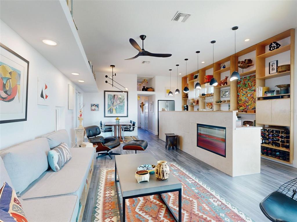 901 Sheepshead Avenue New Smyrna Beach, FL 32169 - Photo 44 of 64 a living room with furniture and wooden floor