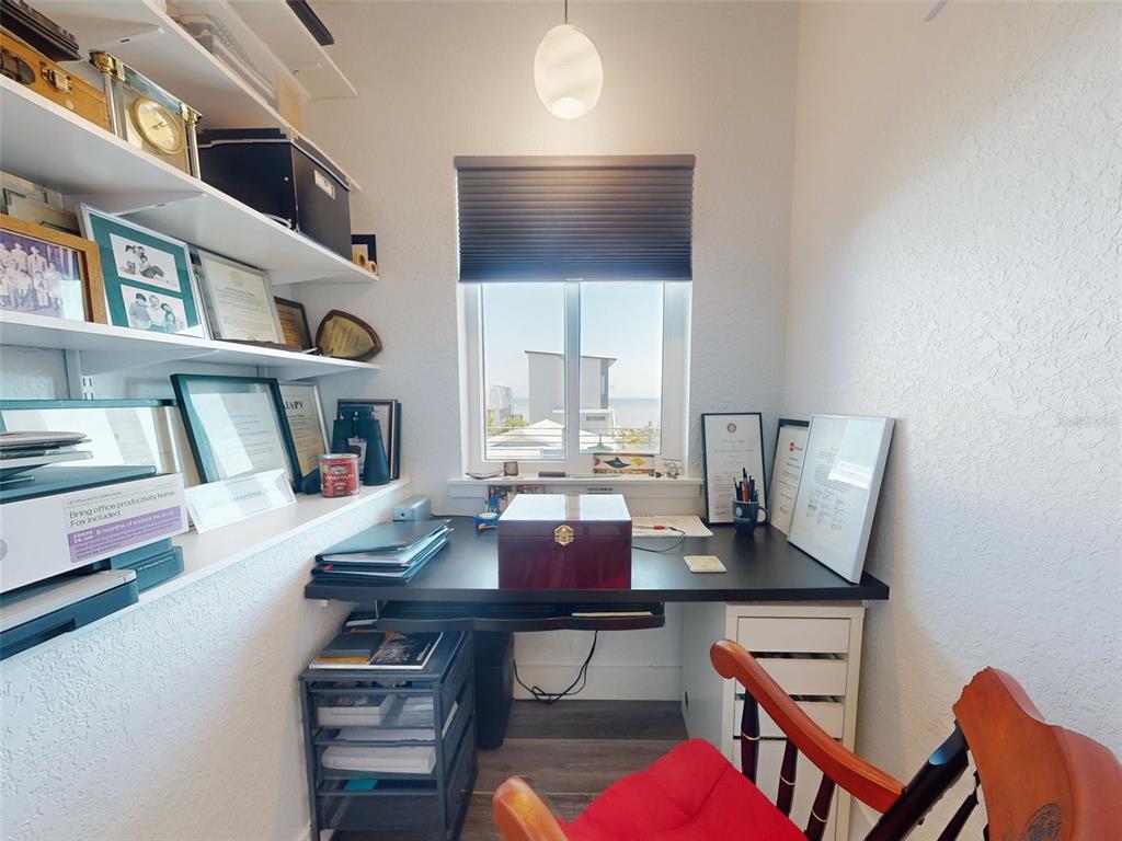 901 Sheepshead Avenue New Smyrna Beach, FL 32169 - Photo 45 of 64 a view of a workspace with furniture