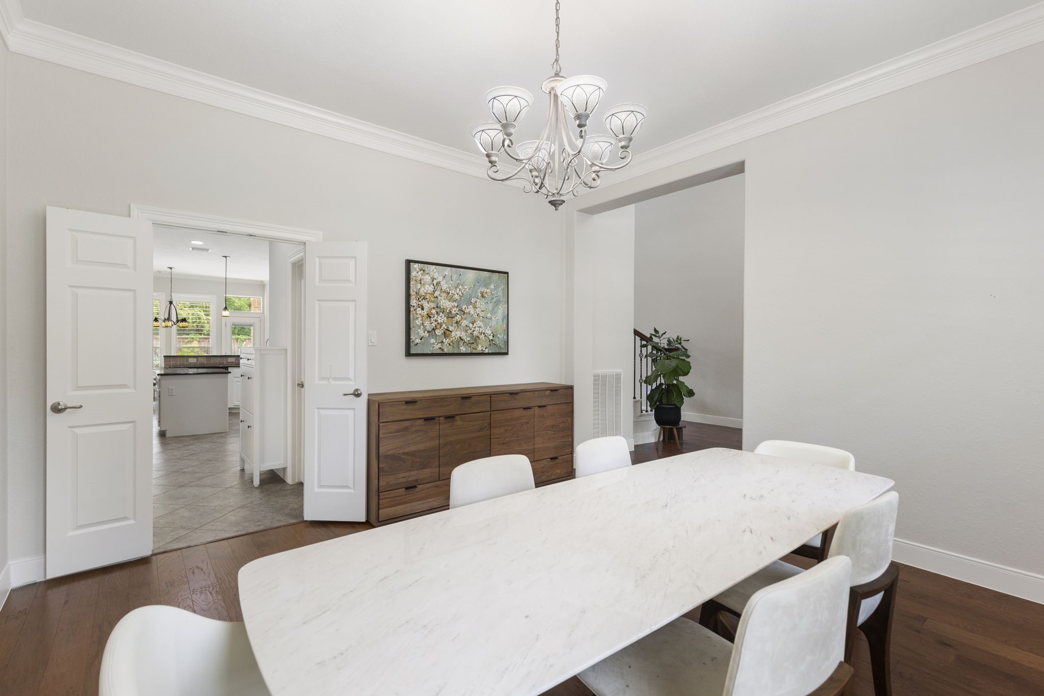 6 Skipwith Place Spring, TX 77382 - Photo 11 of 44 a view of a dining room with furniture wooden floor and a chandelier