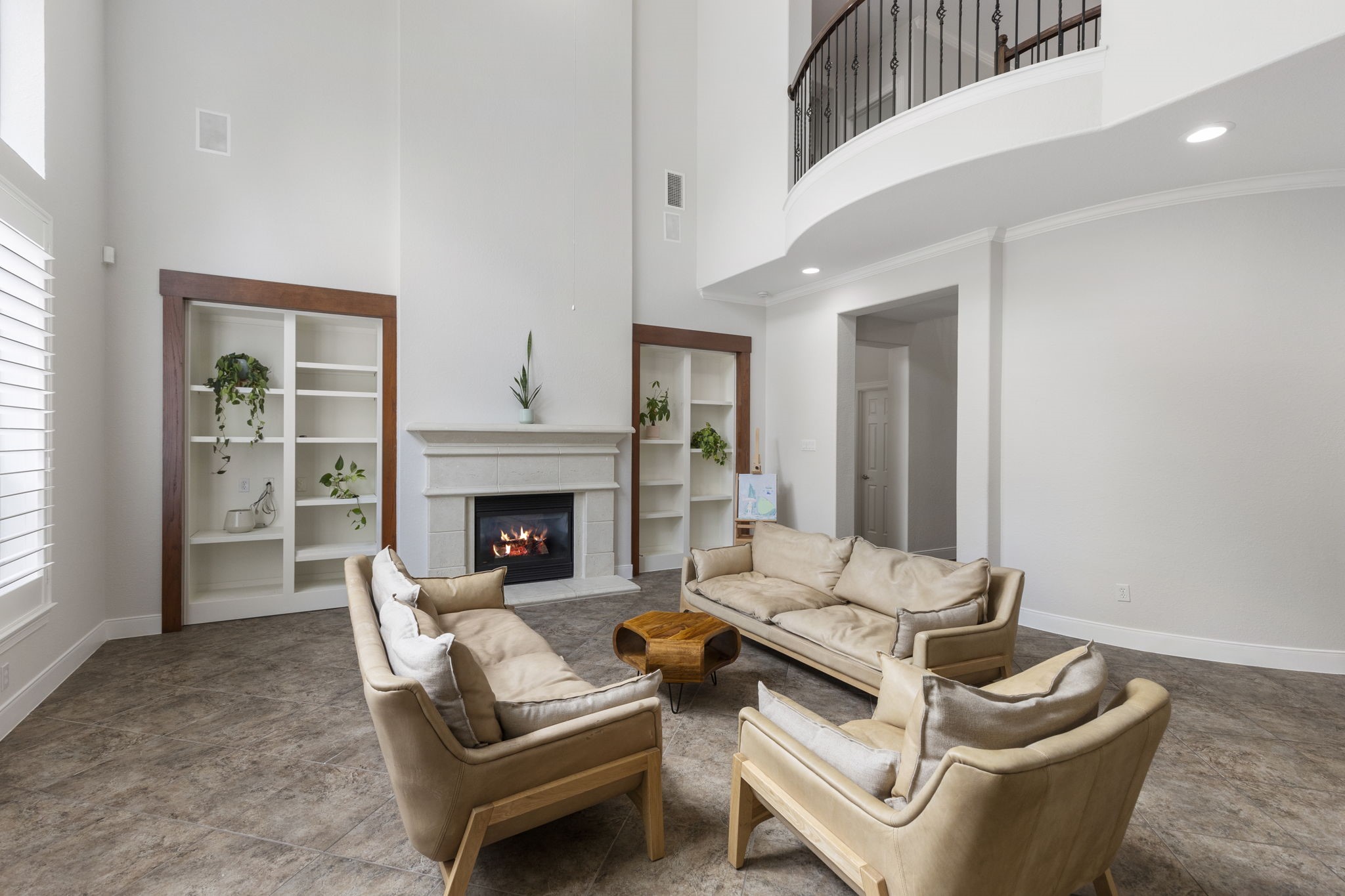 6 Skipwith Place Spring, TX 77382 - Photo 13 of 44 a living room with furniture and a fireplace