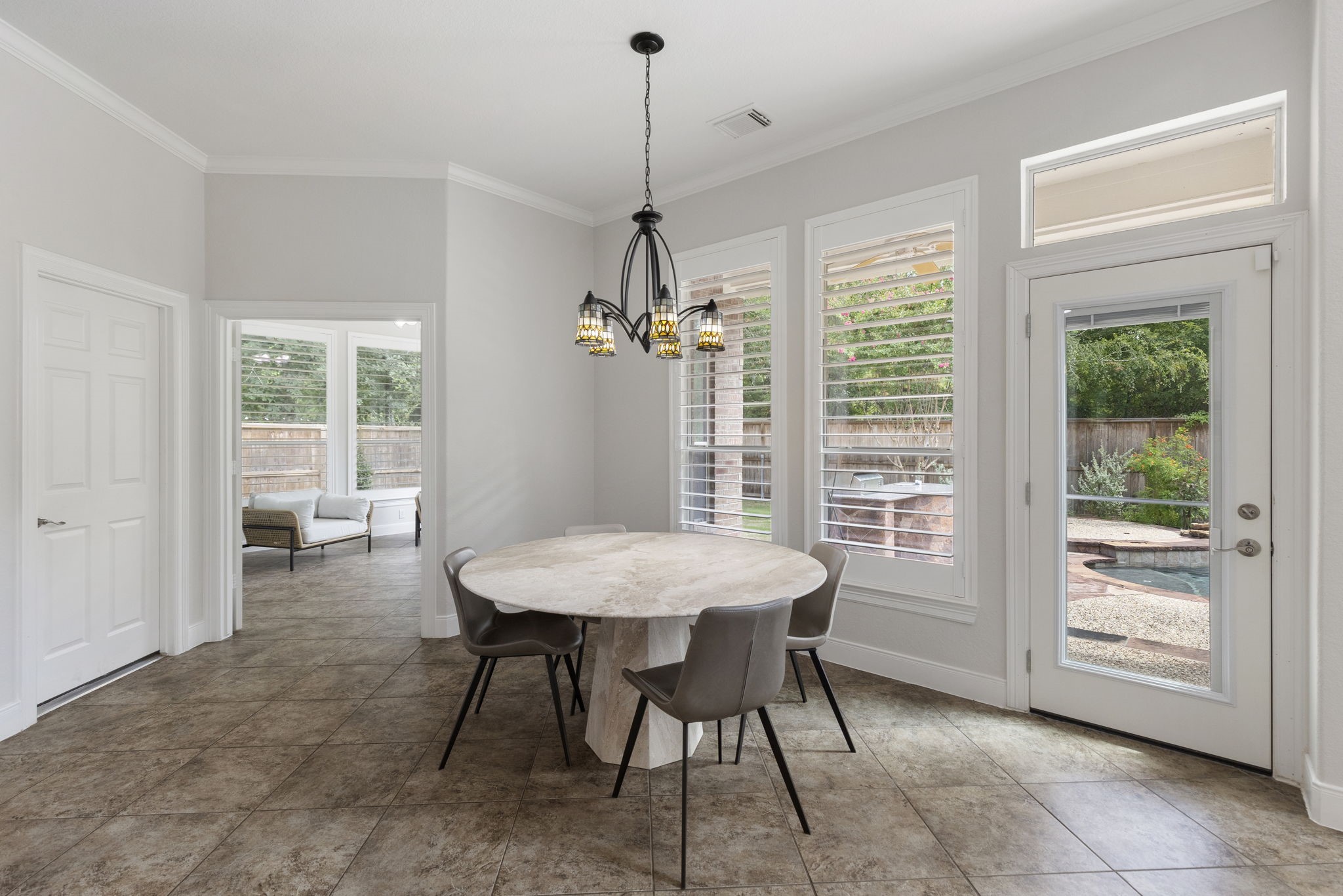 6 Skipwith Place Spring, TX 77382 - Photo 16 of 44 a dining room with furniture a chandelier and window