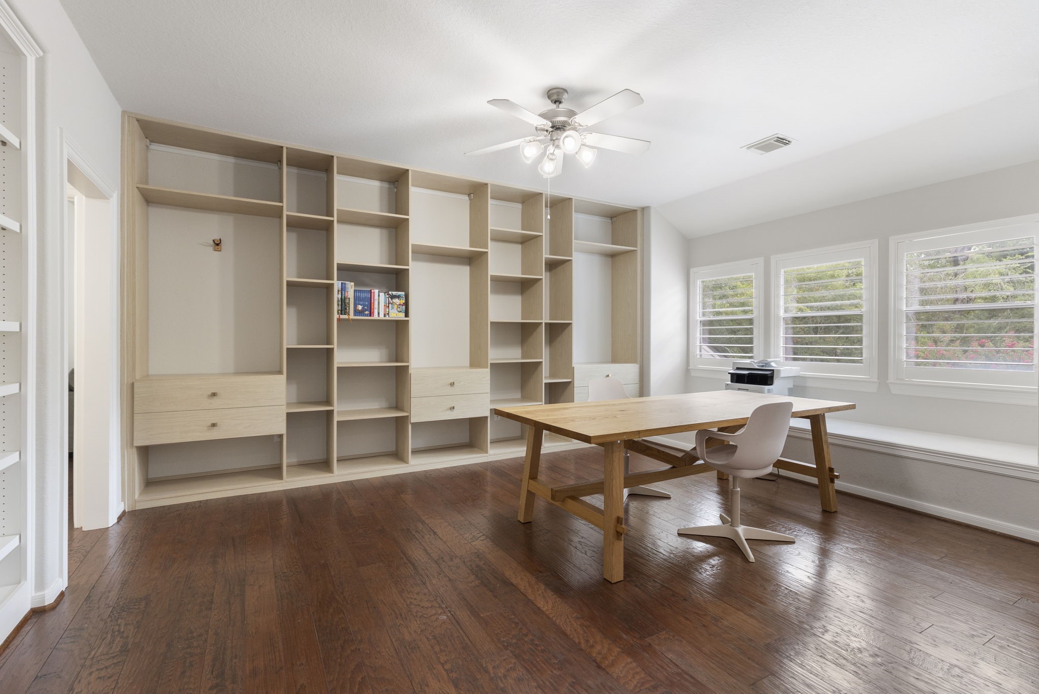 6 Skipwith Place Spring, TX 77382 - Photo 29 of 44 a view of a dining room with furniture and wooden floor