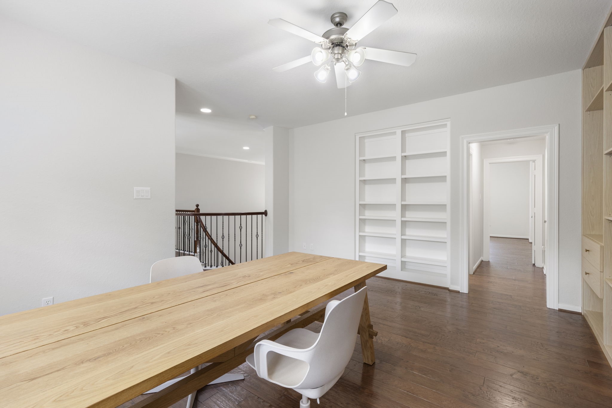 6 Skipwith Place Spring, TX 77382 - Photo 30 of 44 a room with a bed and a chandelier