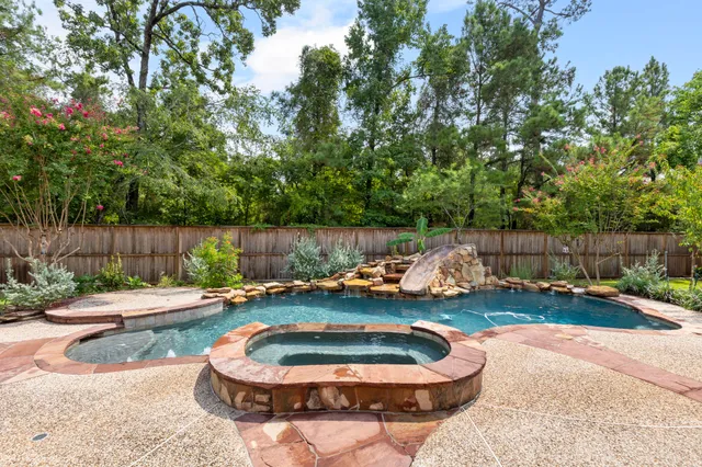 a backyard of house with outdoor seating