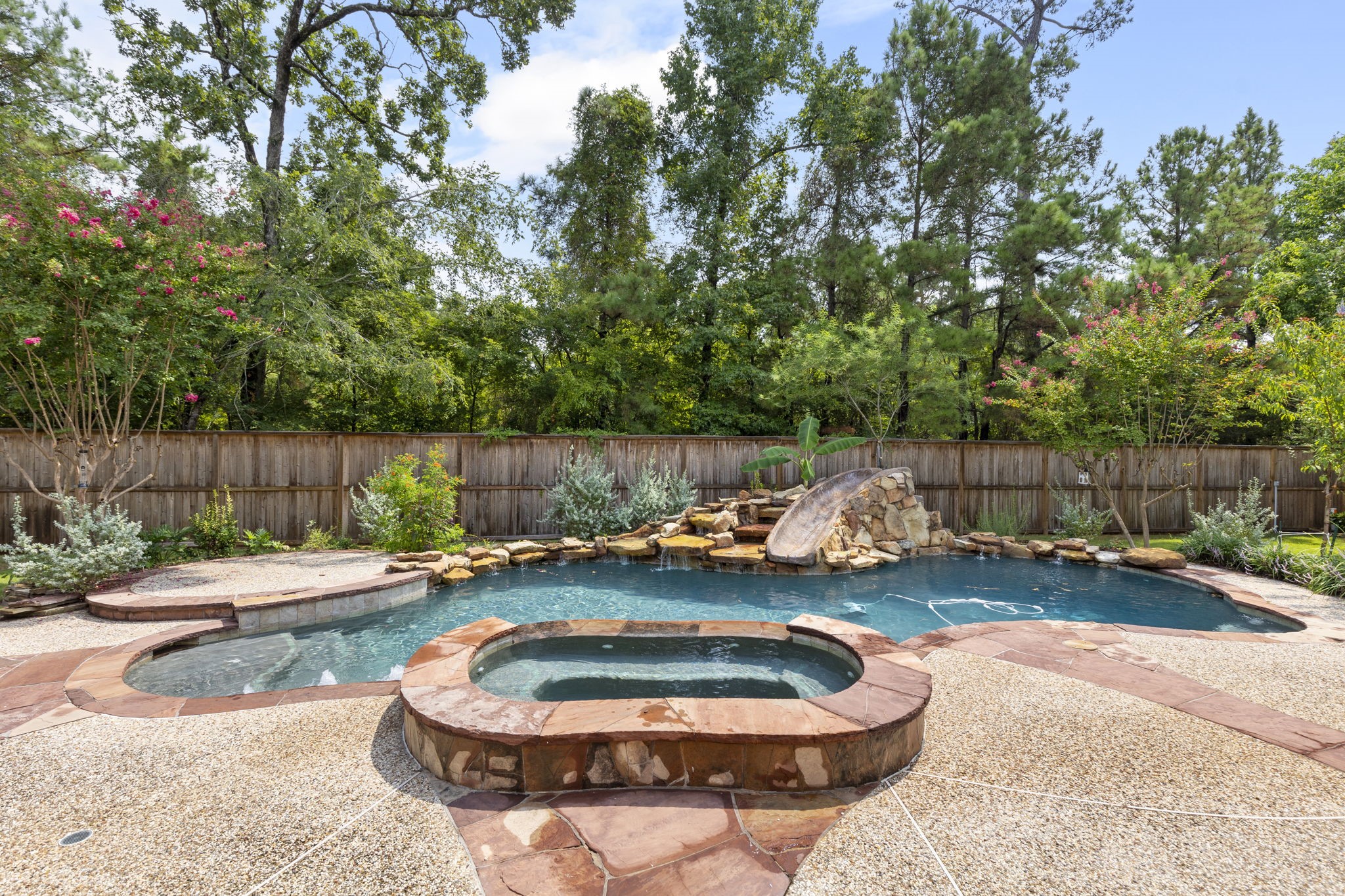 6 Skipwith Place Spring, TX 77382 - Photo 3 of 44 a backyard of house with outdoor seating