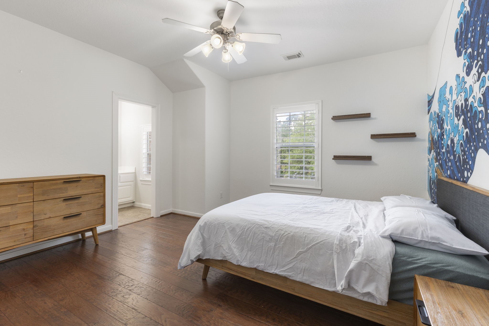 6 Skipwith Place Spring, TX 77382 - Photo 33 of 44 a bedroom with a bed and a window