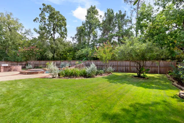 a view of a garden with an outdoor space