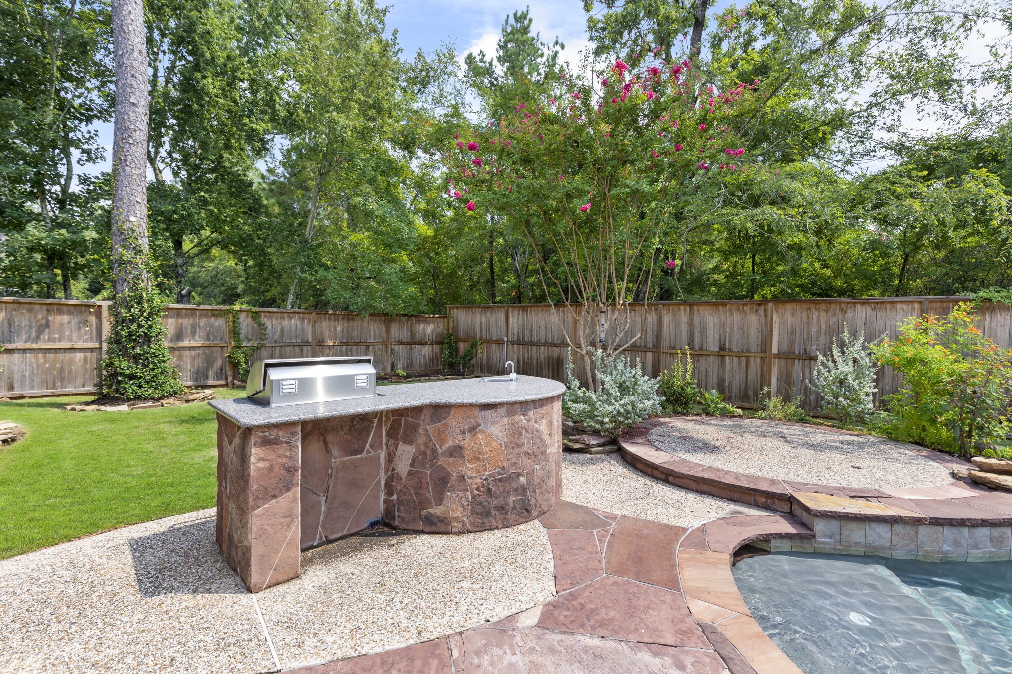6 Skipwith Place Spring, TX 77382 - Photo 4 of 44 a view of a backyard with a sitting area