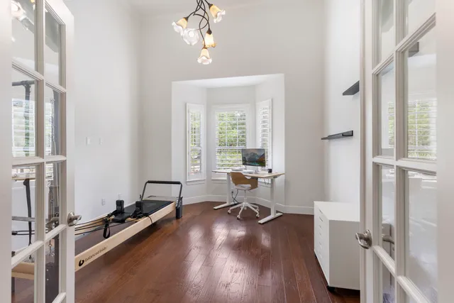 a view of a room with gym equipment
