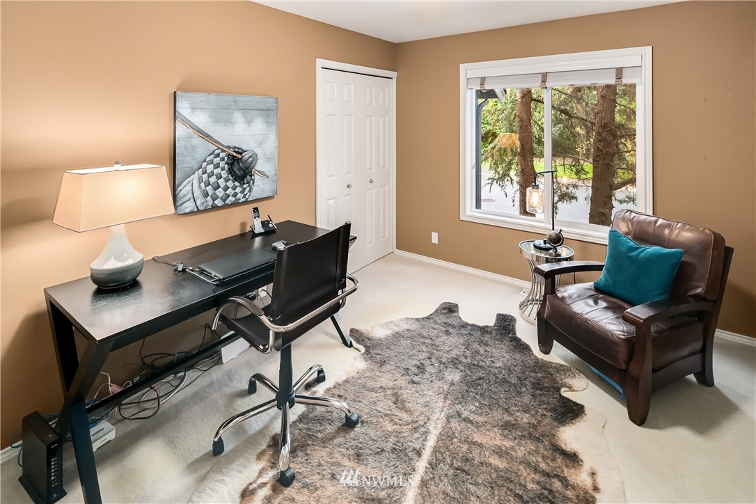 14633 Southeast 82nd Court Newcastle, WA 98059 - Photo 18 of 34 a living room with furniture and a window