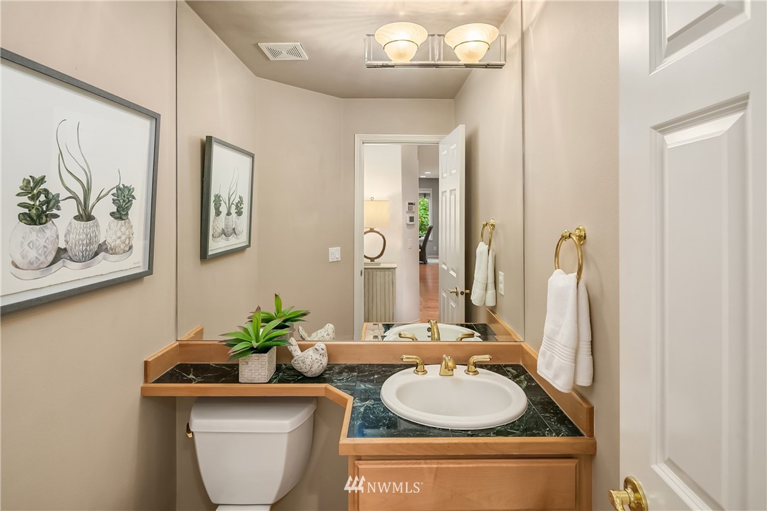 14633 Southeast 82nd Court Newcastle, WA 98059 - Photo 28 of 34 a bath room with sink and mirror