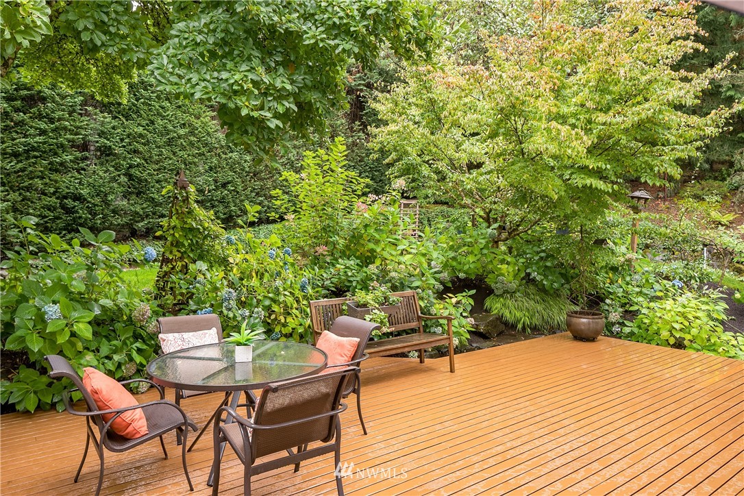 14633 Southeast 82nd Court Newcastle, WA 98059 - Photo 30 of 34 a terrace with a table and chairs