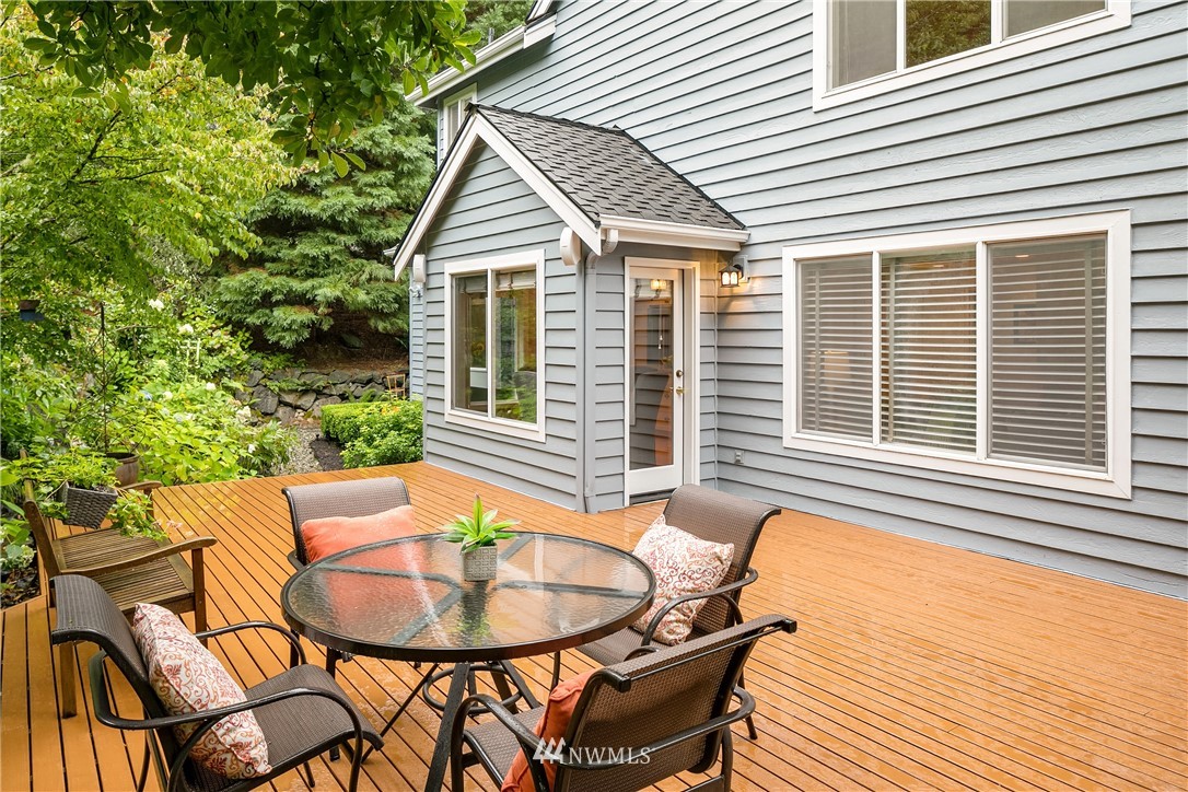 14633 Southeast 82nd Court Newcastle, WA 98059 - Photo 31 of 34 a balcony with table and chairs