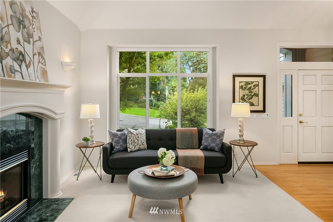 14633 Southeast 82nd Court Newcastle, WA 98059 - Photo 5 of 34 a living room with furniture and a fireplace