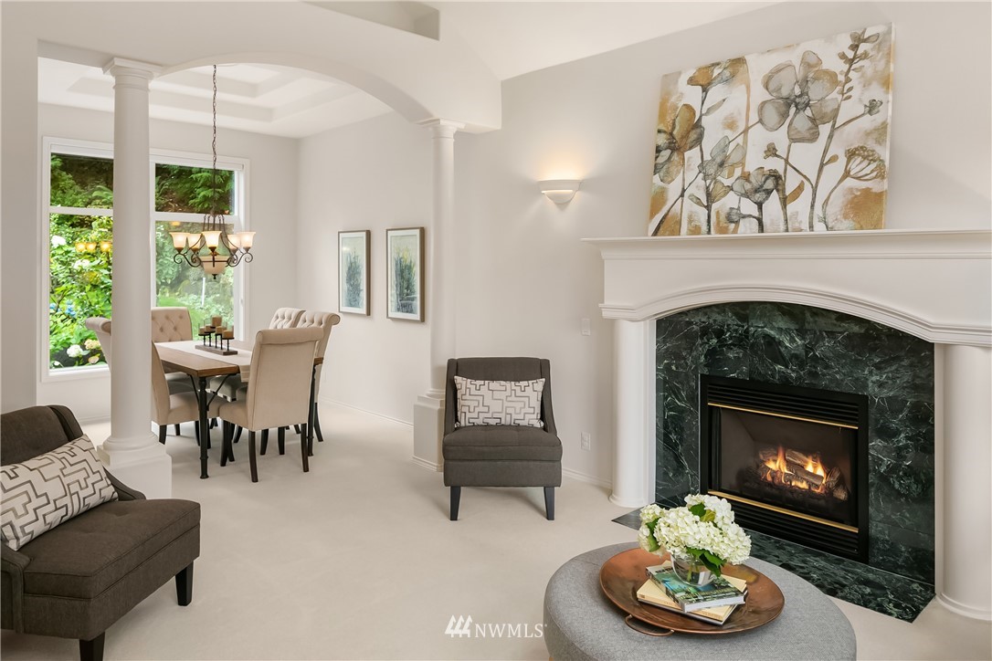 14633 Southeast 82nd Court Newcastle, WA 98059 - Photo 6 of 34 a living room with furniture and a fireplace