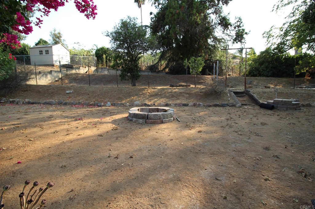 1201 Pepper Drive El Cajon, CA 92021 - Photo 15 of 15 a view of a yard with a fountain