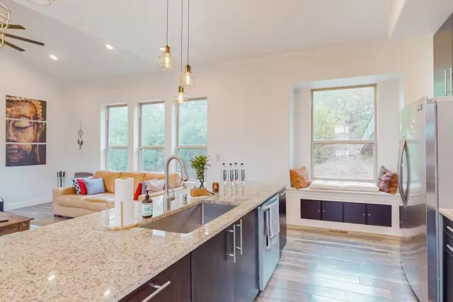 a view of balcony with wooden floor