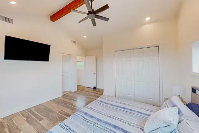 a bathroom with a bathtub and shower