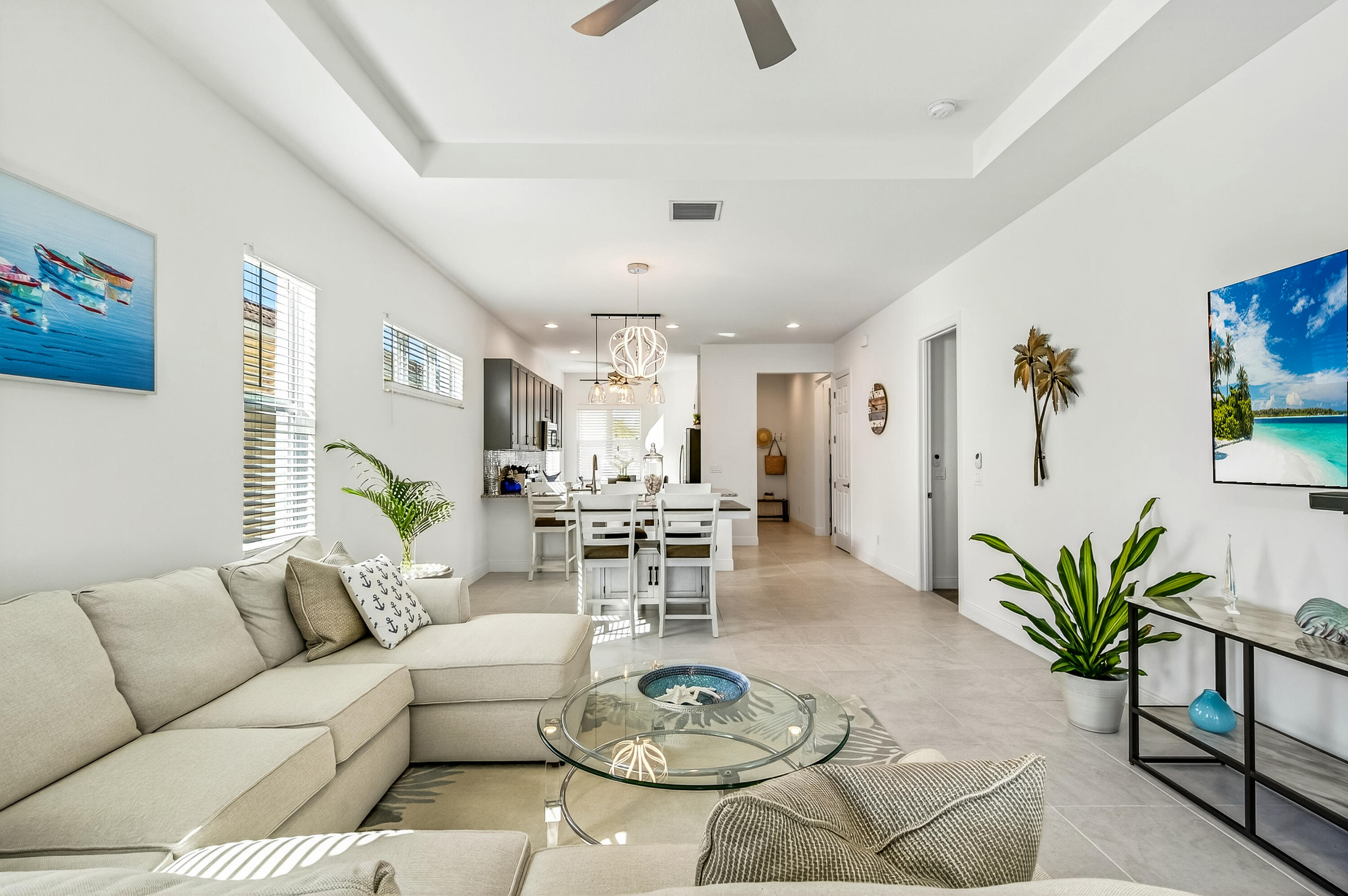 11461 Southwest Visconti Way Port St. Lucie, FL 34986 - Photo 13 of 32 a living room with furniture potted plant and a table