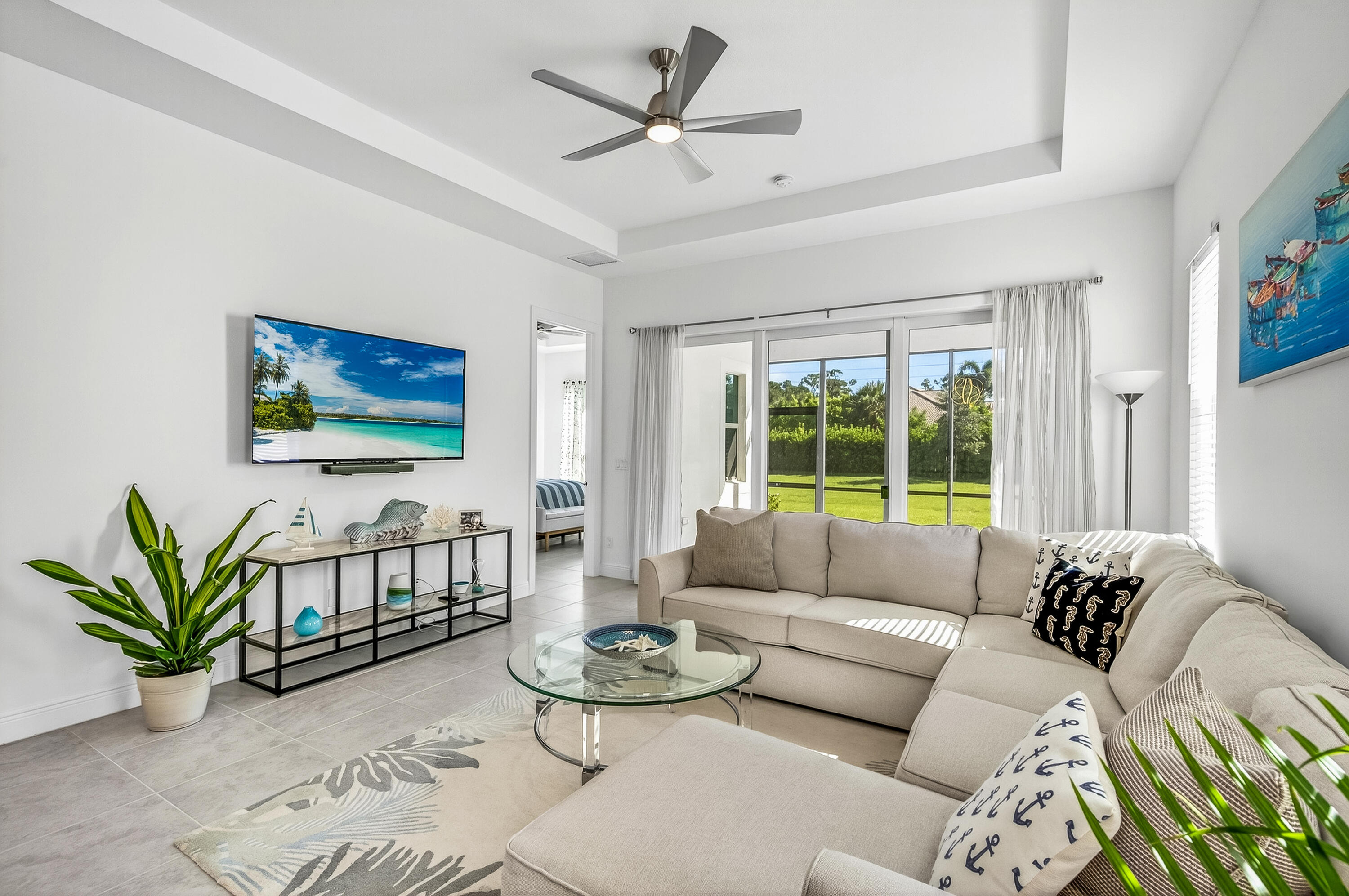 11461 Southwest Visconti Way Port St. Lucie, FL 34986 - Photo 14 of 32 a living room with furniture and a large window