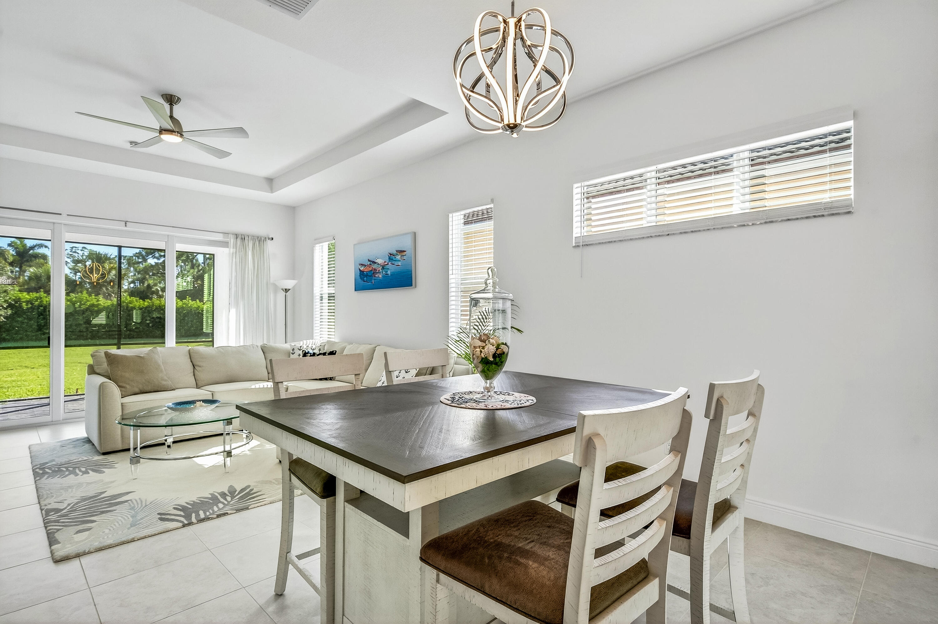 11461 Southwest Visconti Way Port St. Lucie, FL 34986 - Photo 17 of 32 a view of a dining room with furniture window and outside view