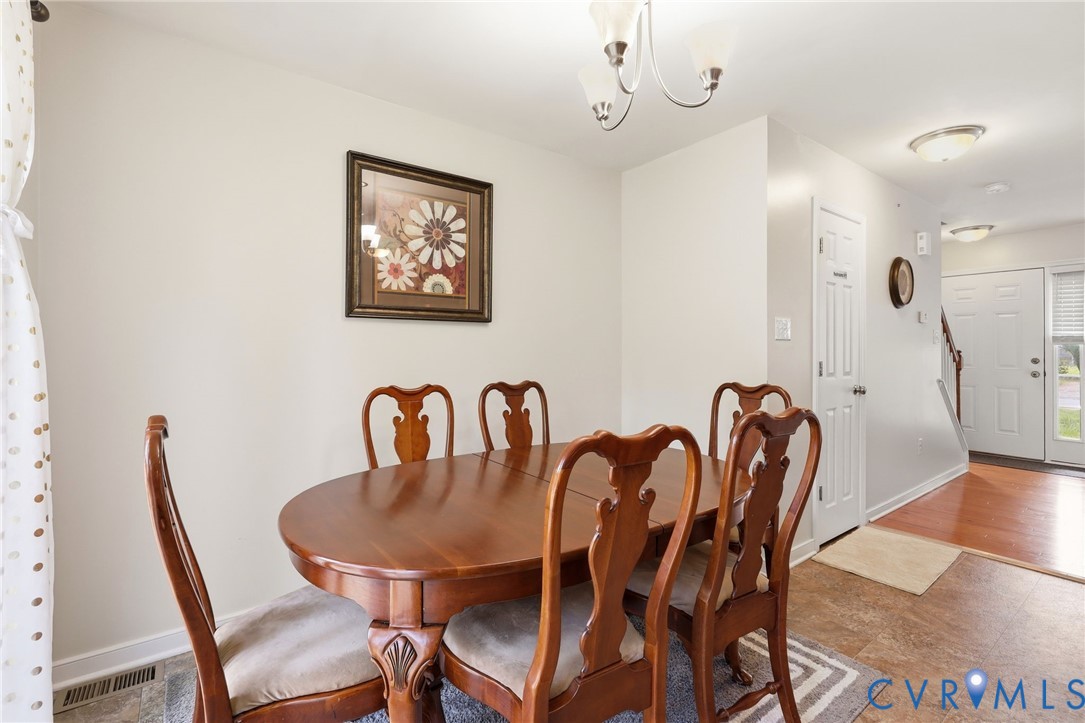 10155 Virginia Road Glen Allen, VA 23060 - Photo 30 of 50 Dining area featuring a contemporary chandelier, w