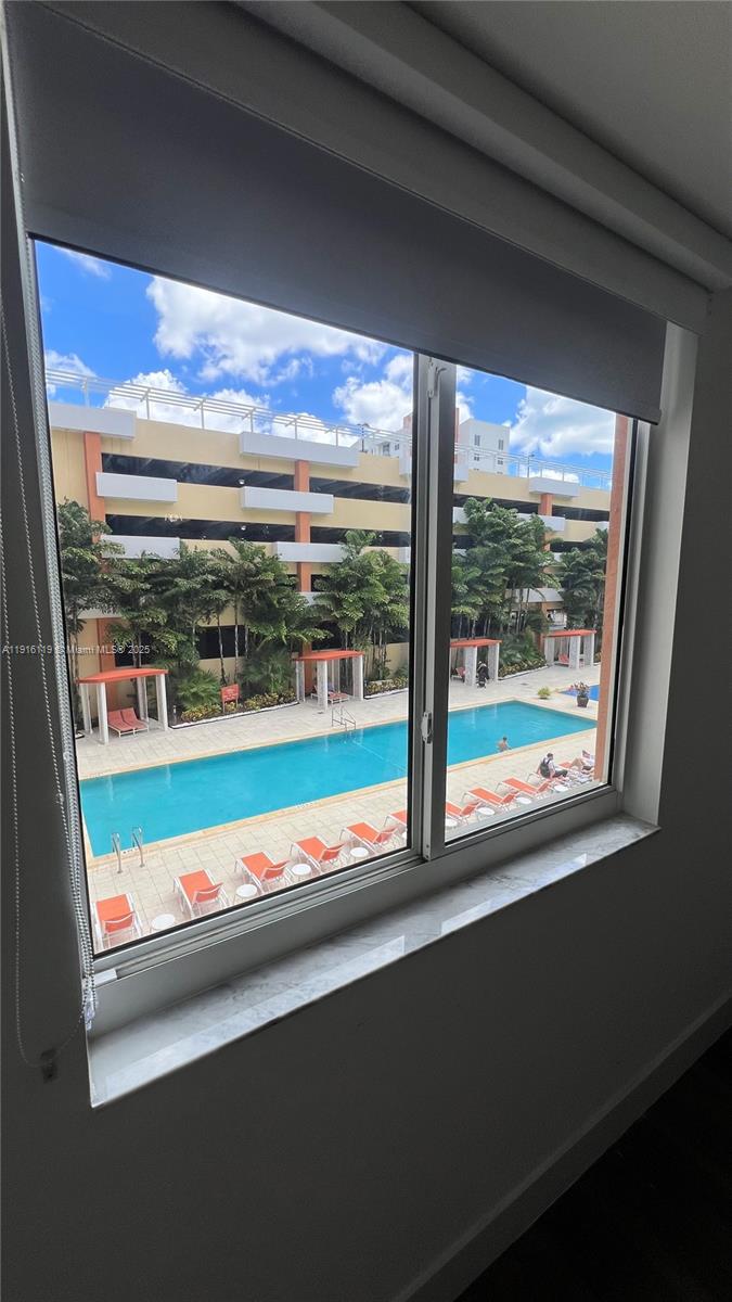 2775 Northeast 187th Street, Unit 227 Aventura, FL 33180 - Photo 2 of 17 a view of an outdoor space with a large window