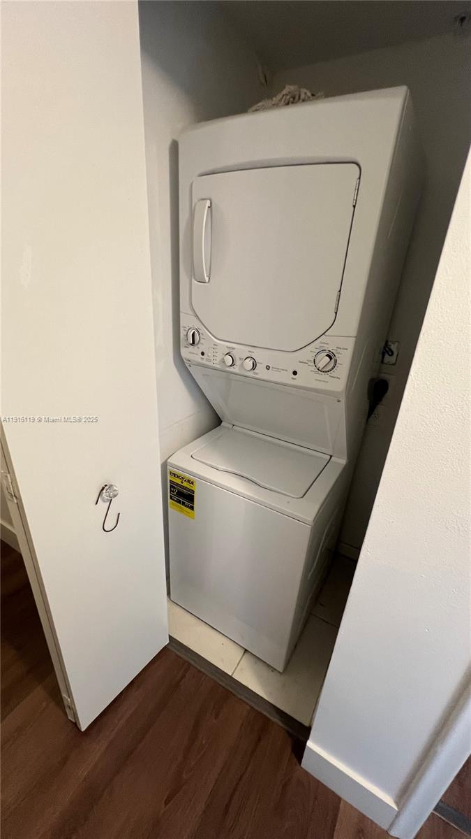 2775 Northeast 187th Street, Unit 227 Aventura, FL 33180 - Photo 7 of 17 a utility room with dryer and washer