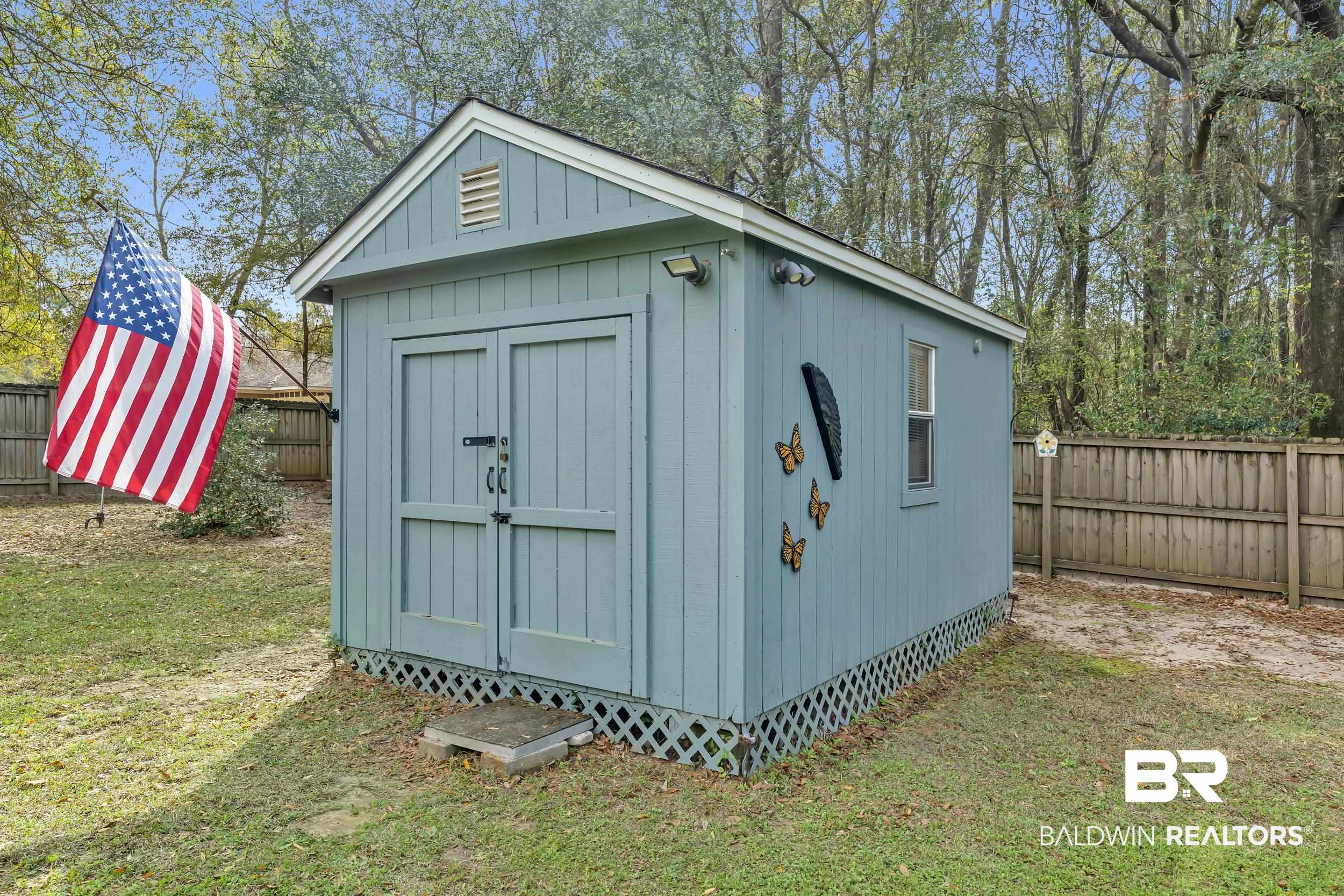 191 Robbins Boulevard Daphne, AL 36526 - Photo 24 of 24 View of shed featuring a fenced backyard
