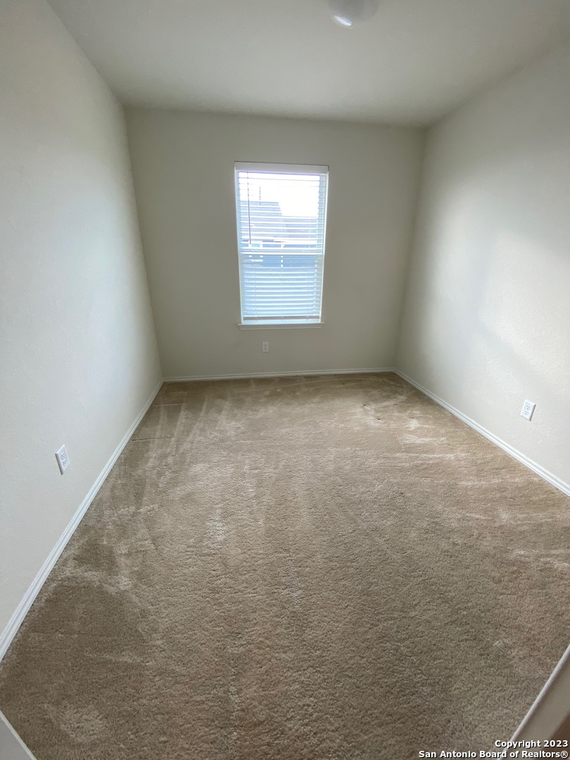 11834 Burnett Ranch San Antonio, TX 78254 - Photo 13 of 18 an empty room with a window