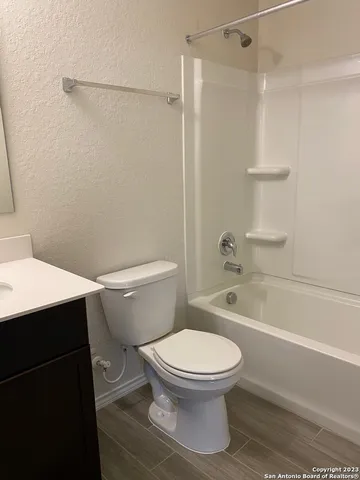 a view of backyard with trampoline